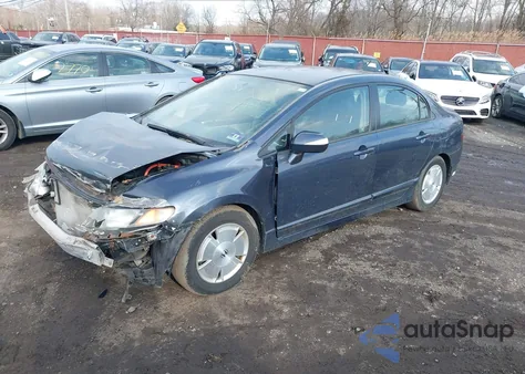 2006 Honda Civic Hybrid z USA, uszkodzony, nr VIN JHMFA36226S019565